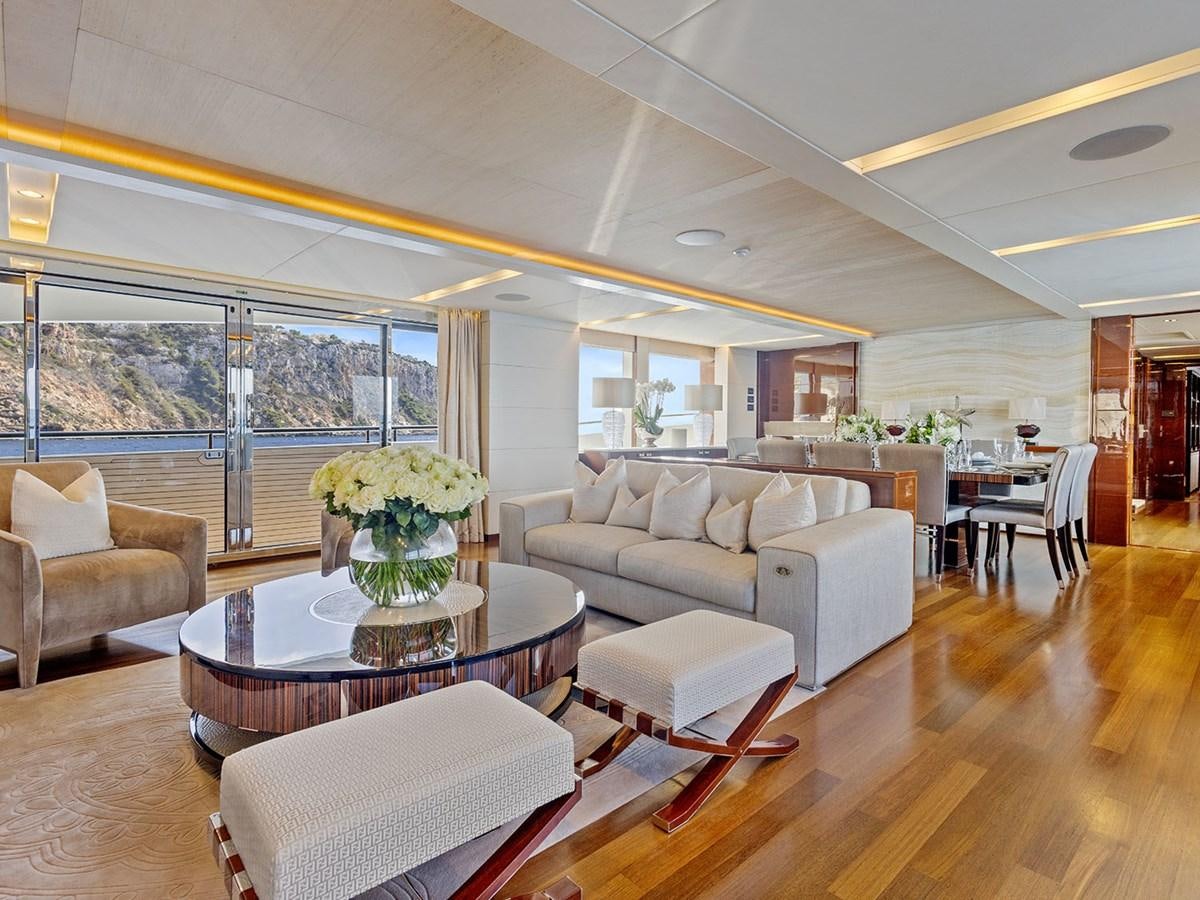 a living room with a large window aboard ACE 2 Yacht for Sale