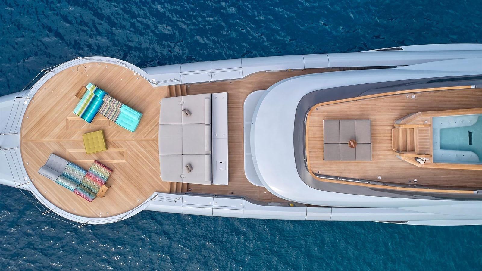 a group of small wooden buildings aboard GECO Yacht for Sale