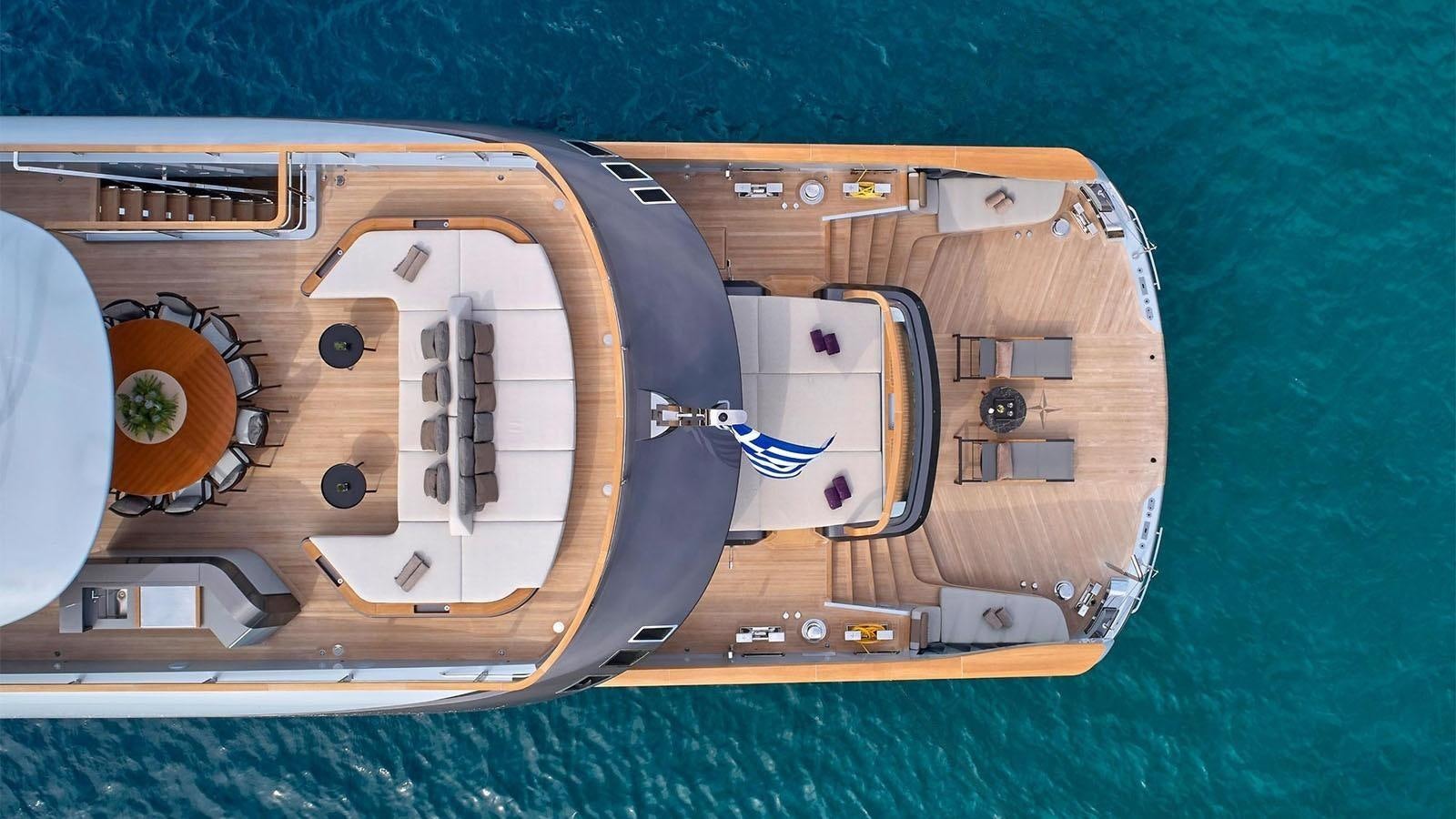 a wooden ship on a body of water aboard GECO Yacht for Sale