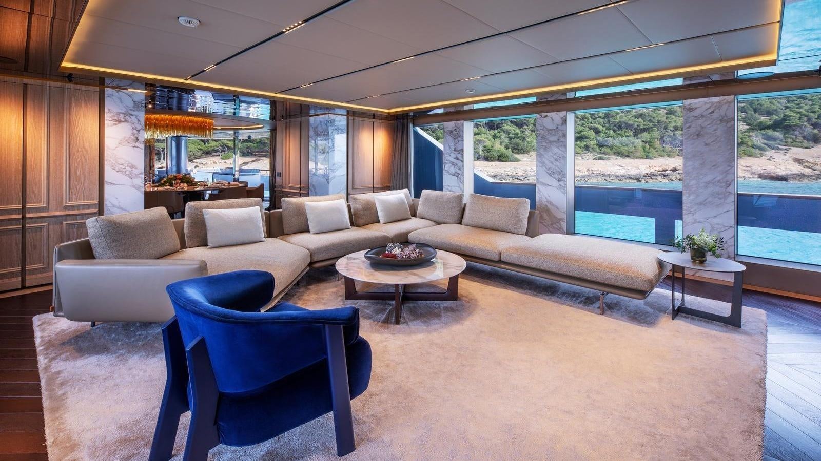 a living room with a large window aboard GECO Yacht for Sale