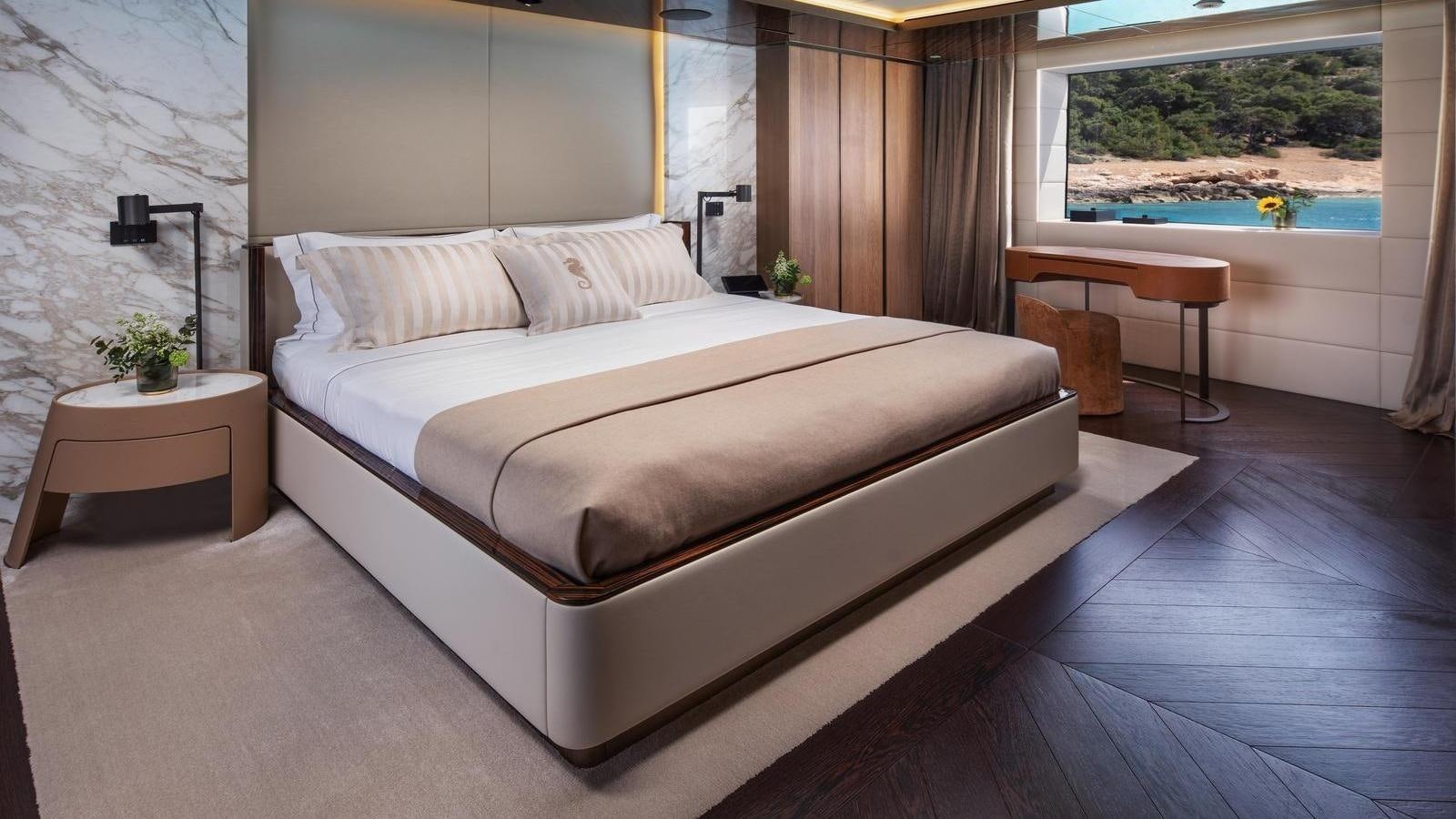 a bed in a room aboard GECO Yacht for Sale