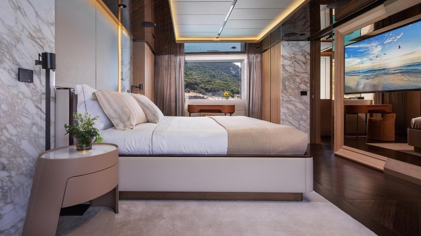 a bed in a room aboard GECO Yacht for Sale