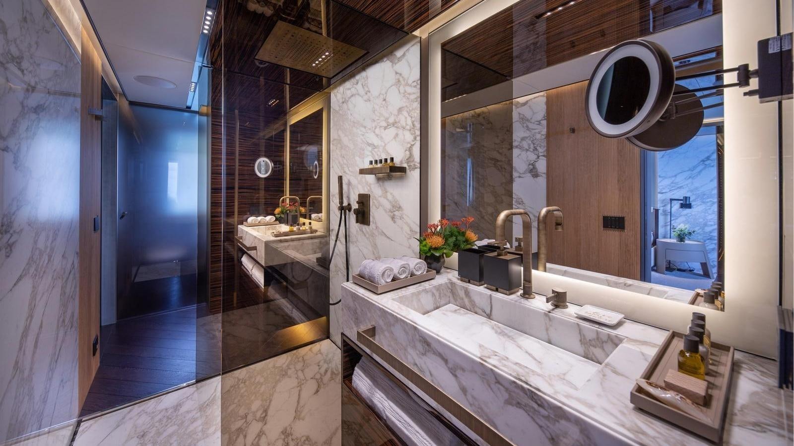 a bathroom with a large tub aboard GECO Yacht for Sale