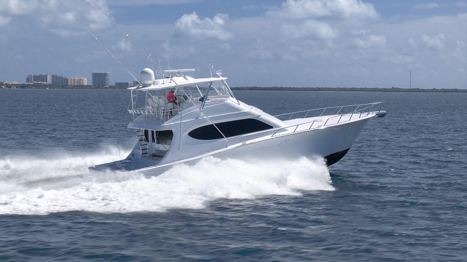 a white boat on the water aboard GT 70 Yacht for Sale