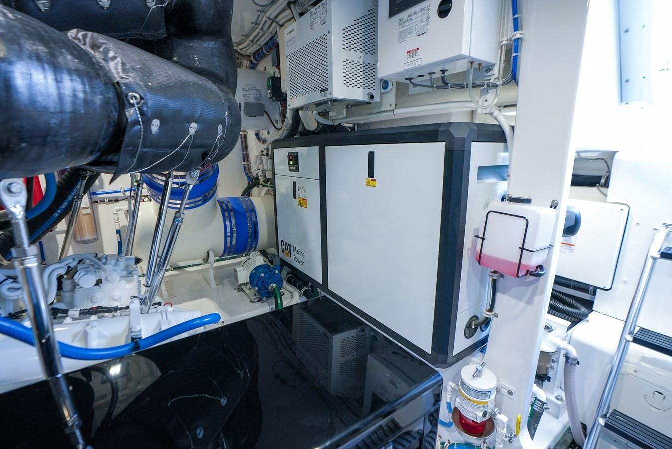 a machine with a large piece of equipment on it aboard GT 70 Yacht for Sale