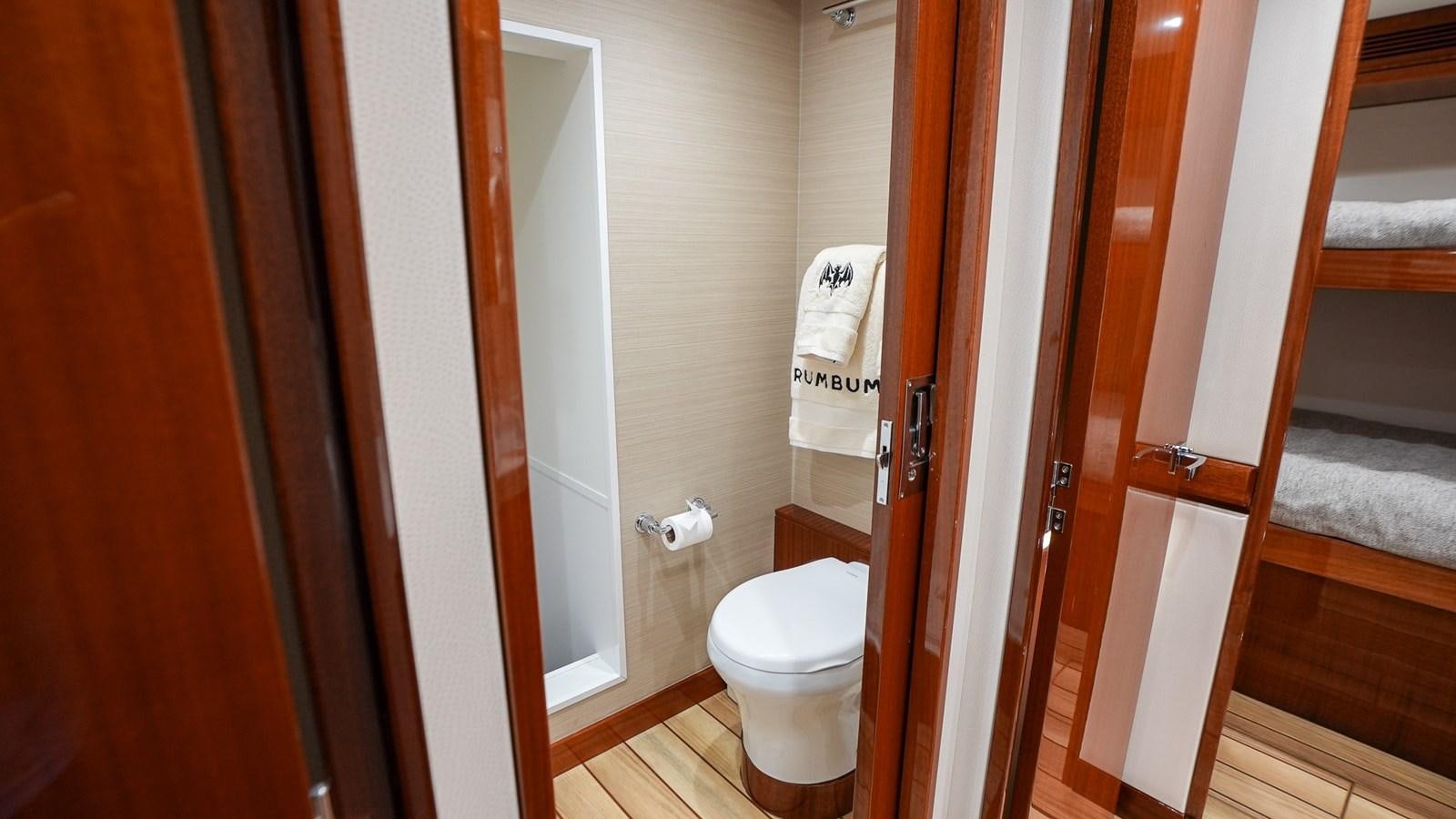 a bathroom with a toilet and a sink aboard GT 70 Yacht for Sale