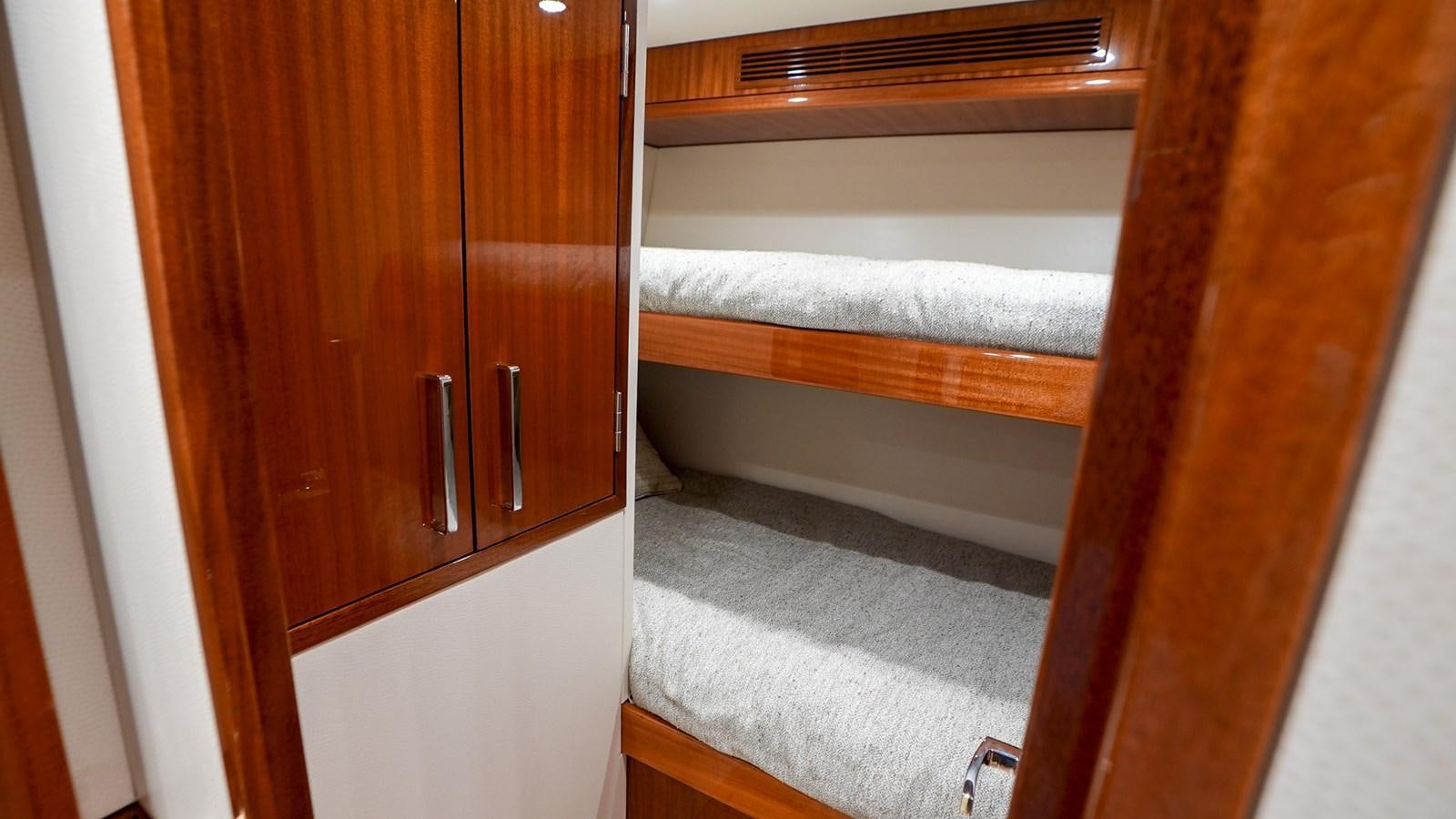 a closet with a door open aboard GT 70 Yacht for Sale