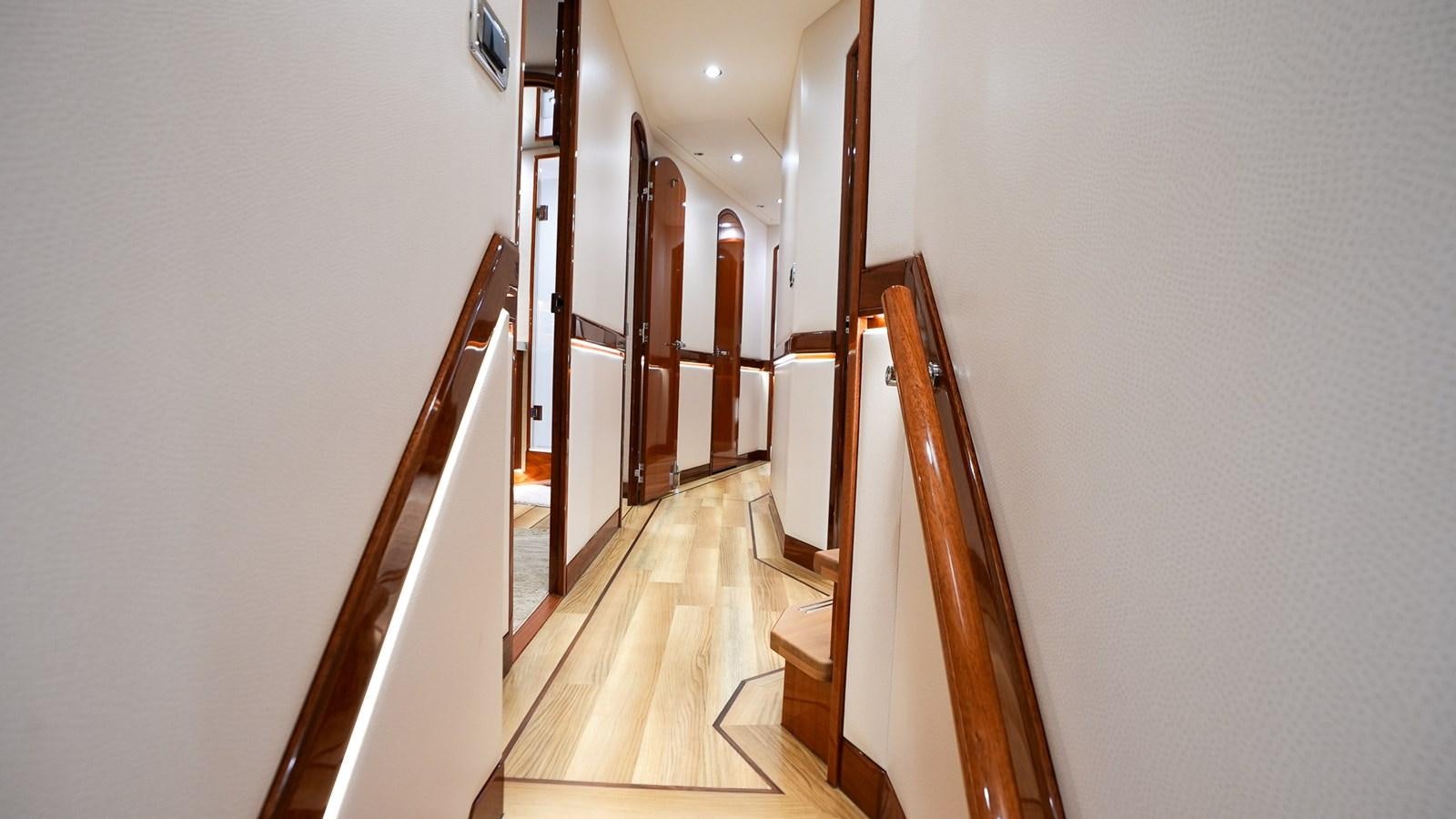 a hallway with white walls aboard GT 70 Yacht for Sale