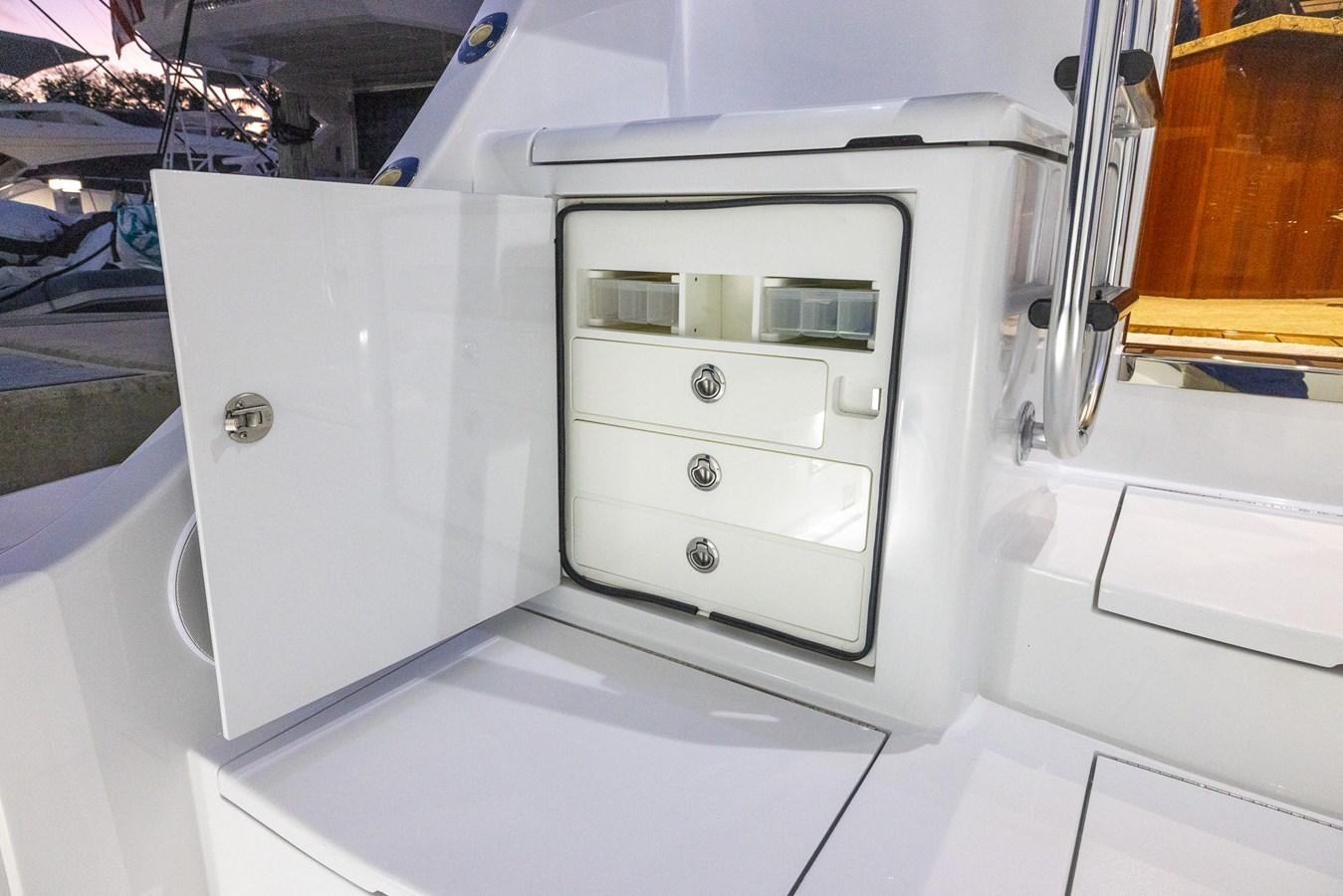 a white machine on display aboard GT 70 Yacht for Sale