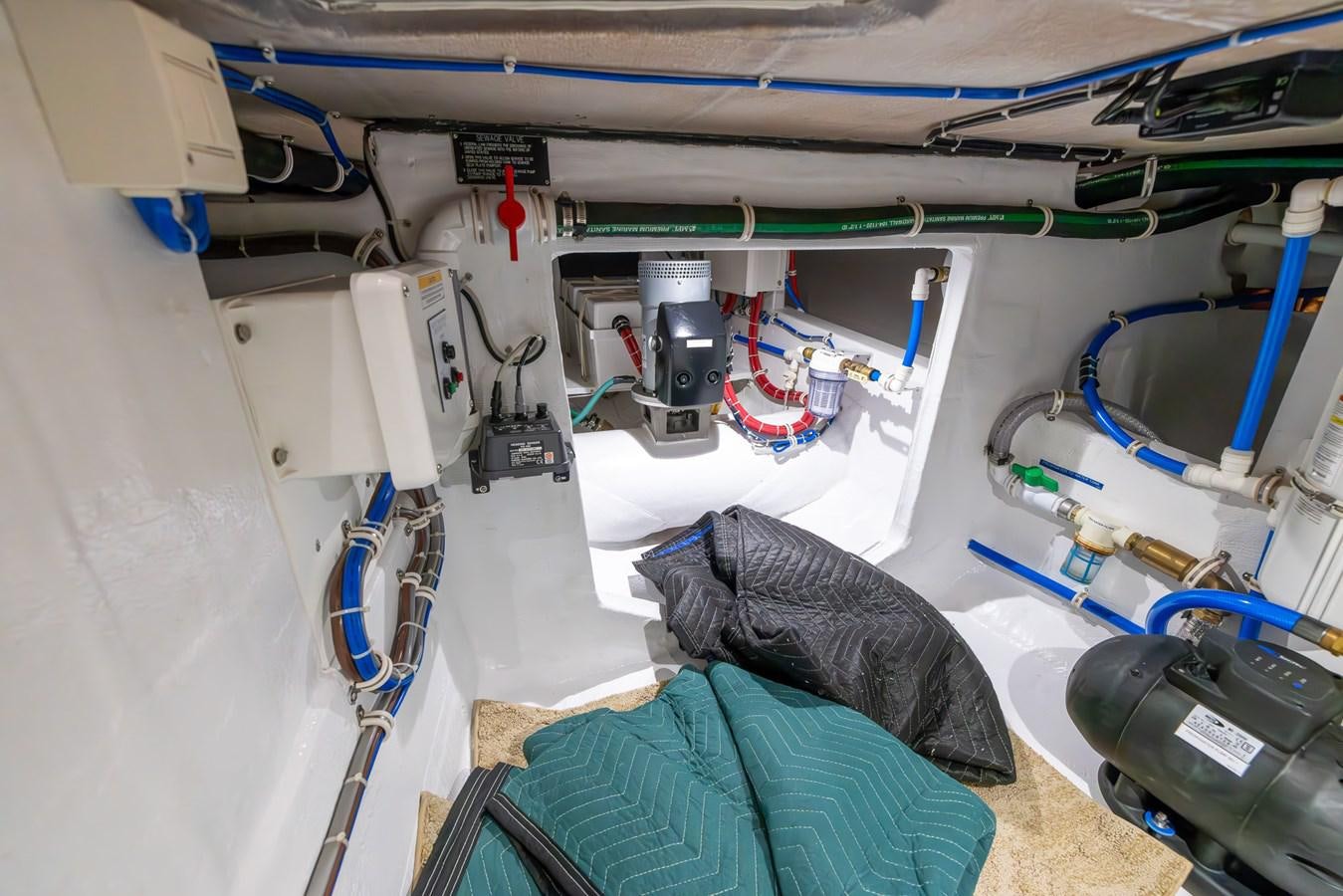 a person lying on a bed aboard GT 70 Yacht for Sale