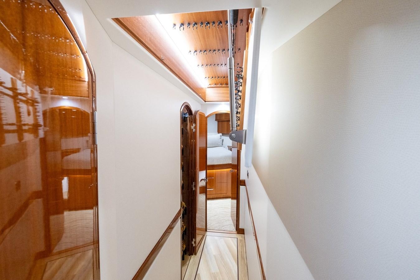 a hallway with a wood door and a wood door aboard GT 70 Yacht for Sale
