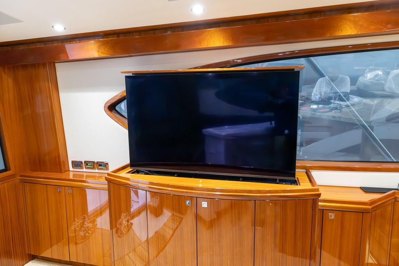 a tv on a cabinet aboard GT 70 Yacht for Sale