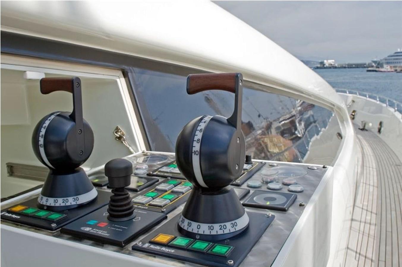 a steering wheel and dashboard of a car aboard LIBERDADE Yacht for Sale