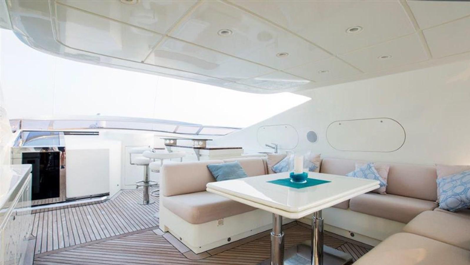 a room with a couch and a table aboard LIBERDADE Yacht for Sale