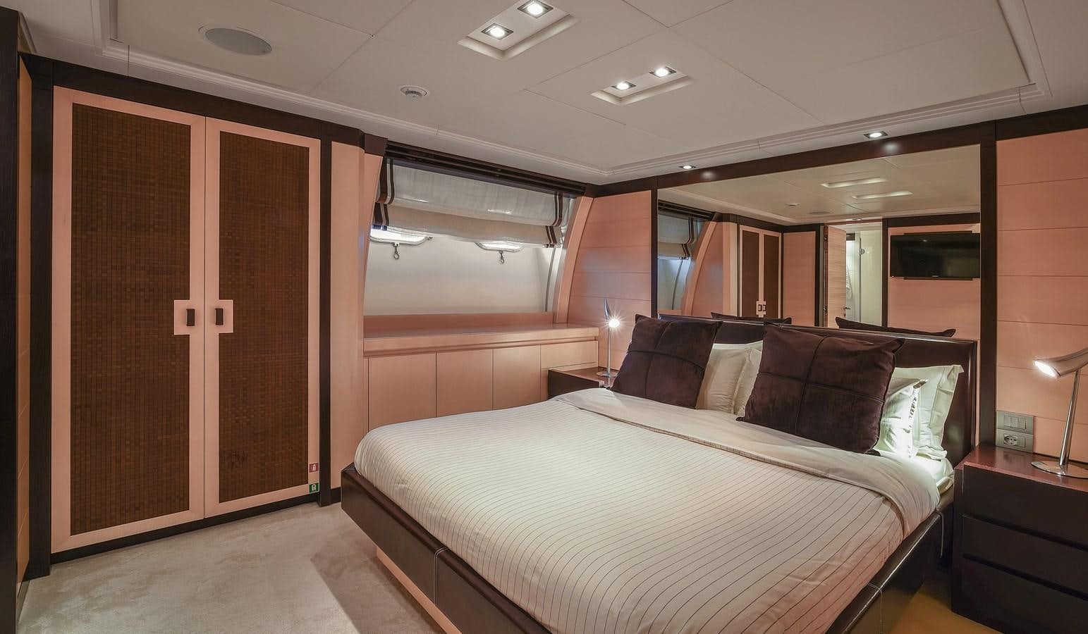 a bed in a room aboard LIBERDADE Yacht for Sale