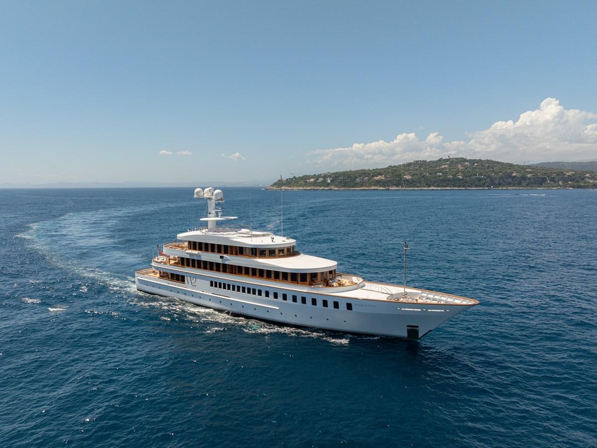 a large white ship in the water aboard WEDGE TOO Yacht for Sale