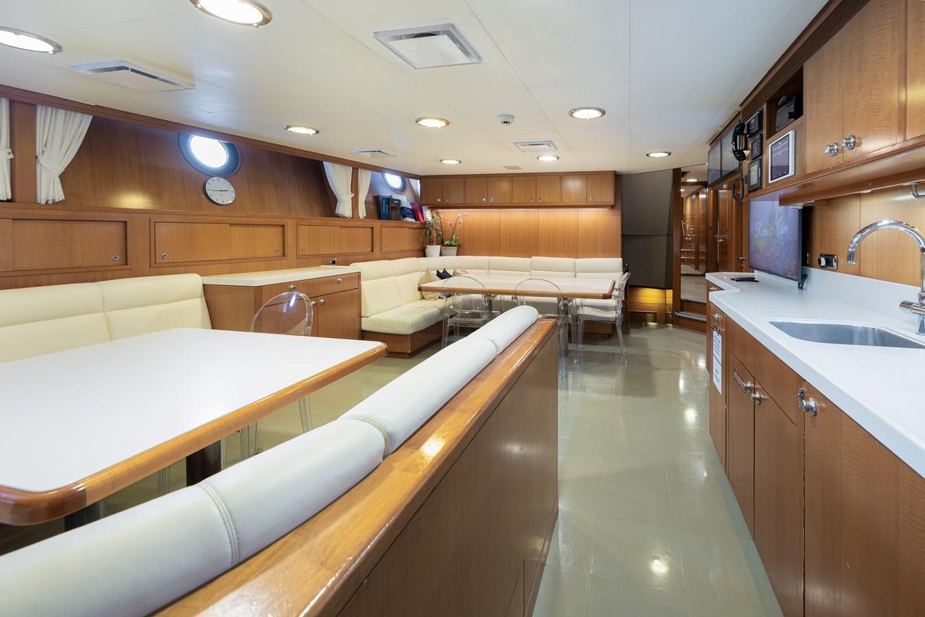 a room with a bed and a sink aboard WEDGE TOO Yacht for Sale