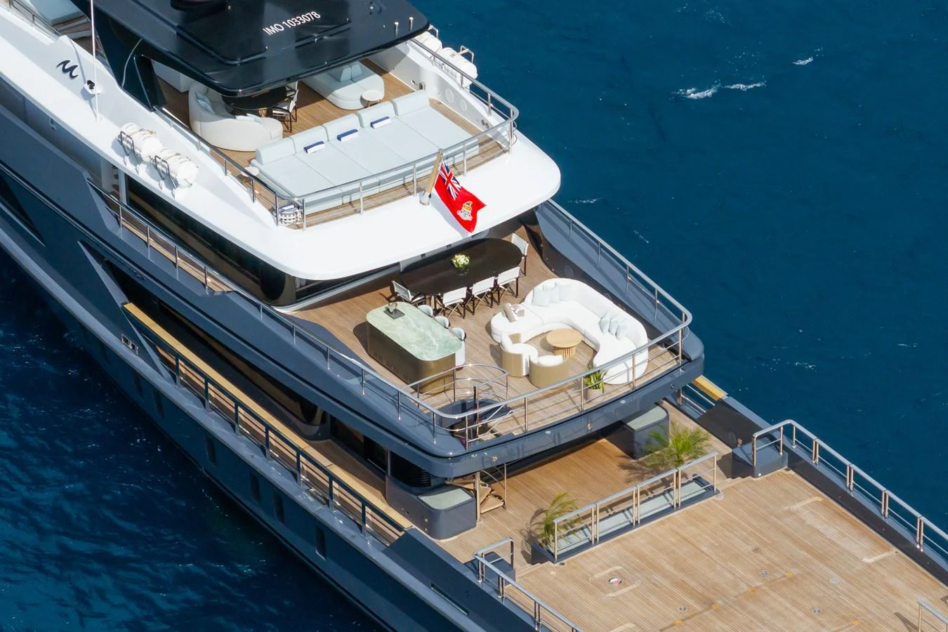 a large ship docked aboard M Yacht for Sale