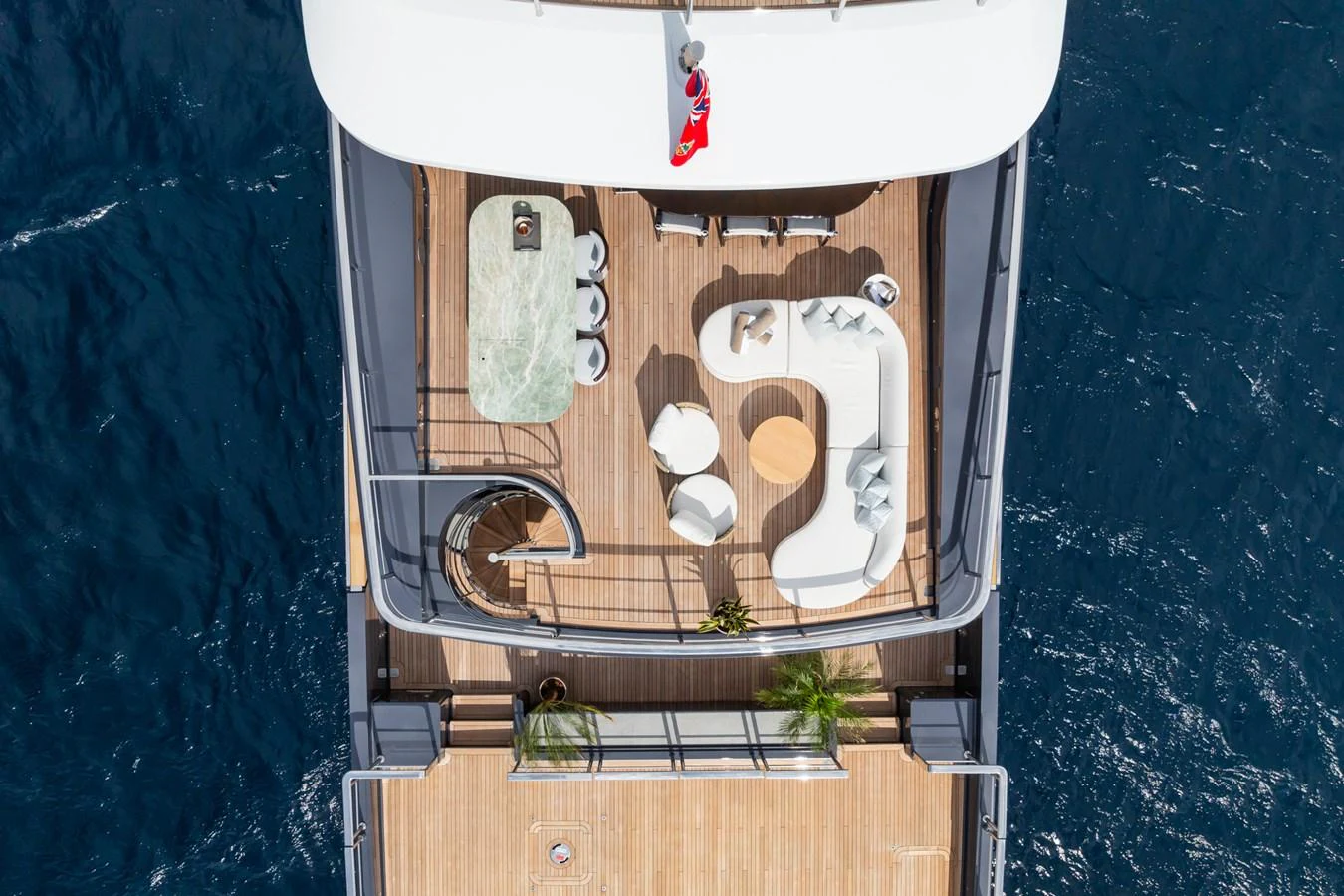 a white container with a plant in it aboard M Yacht for Sale