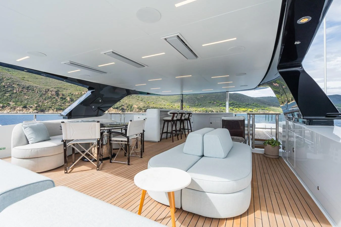 a room with a view of the water and the land aboard M Yacht for Sale