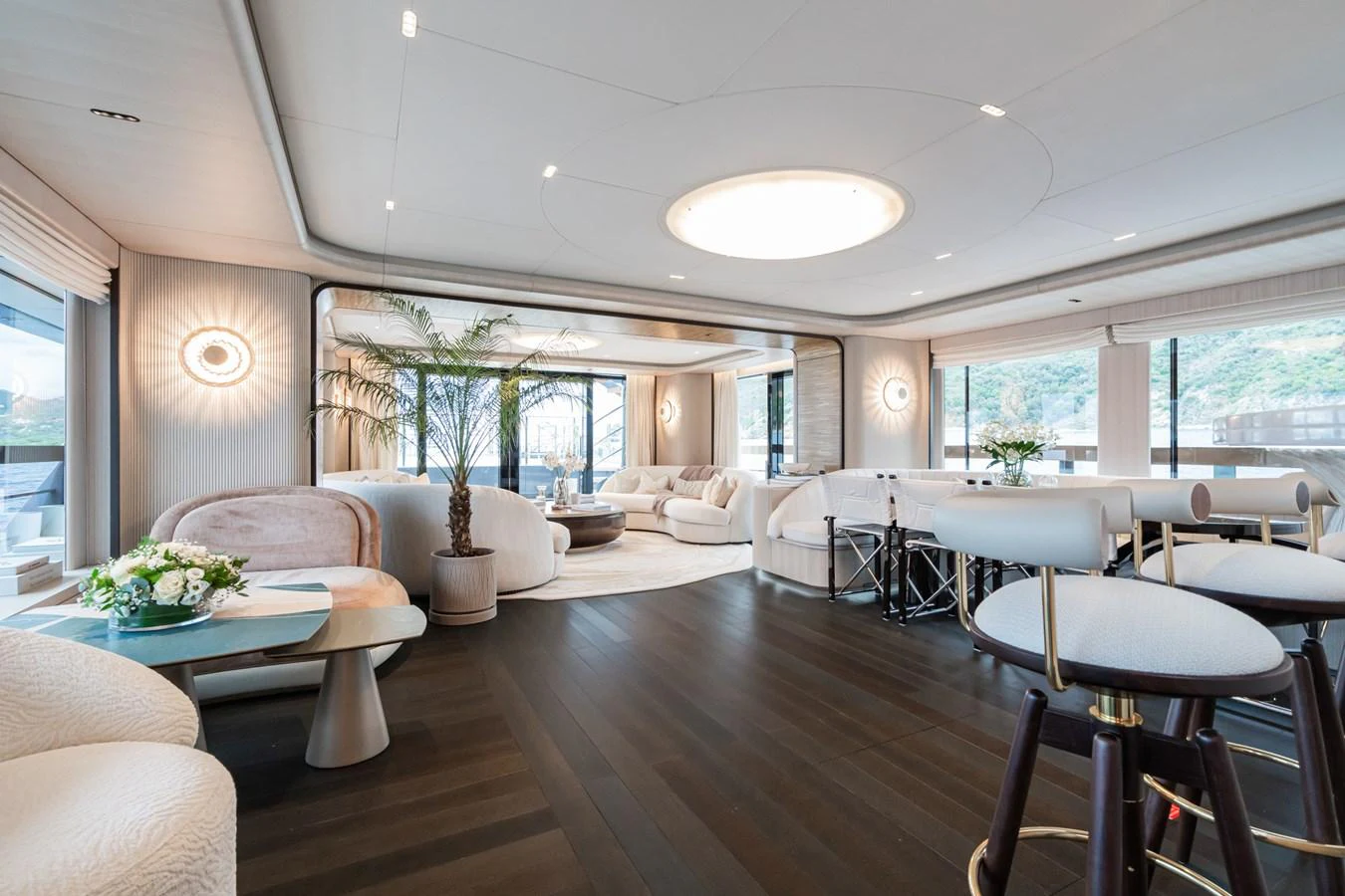 a room with tables and chairs aboard M Yacht for Sale