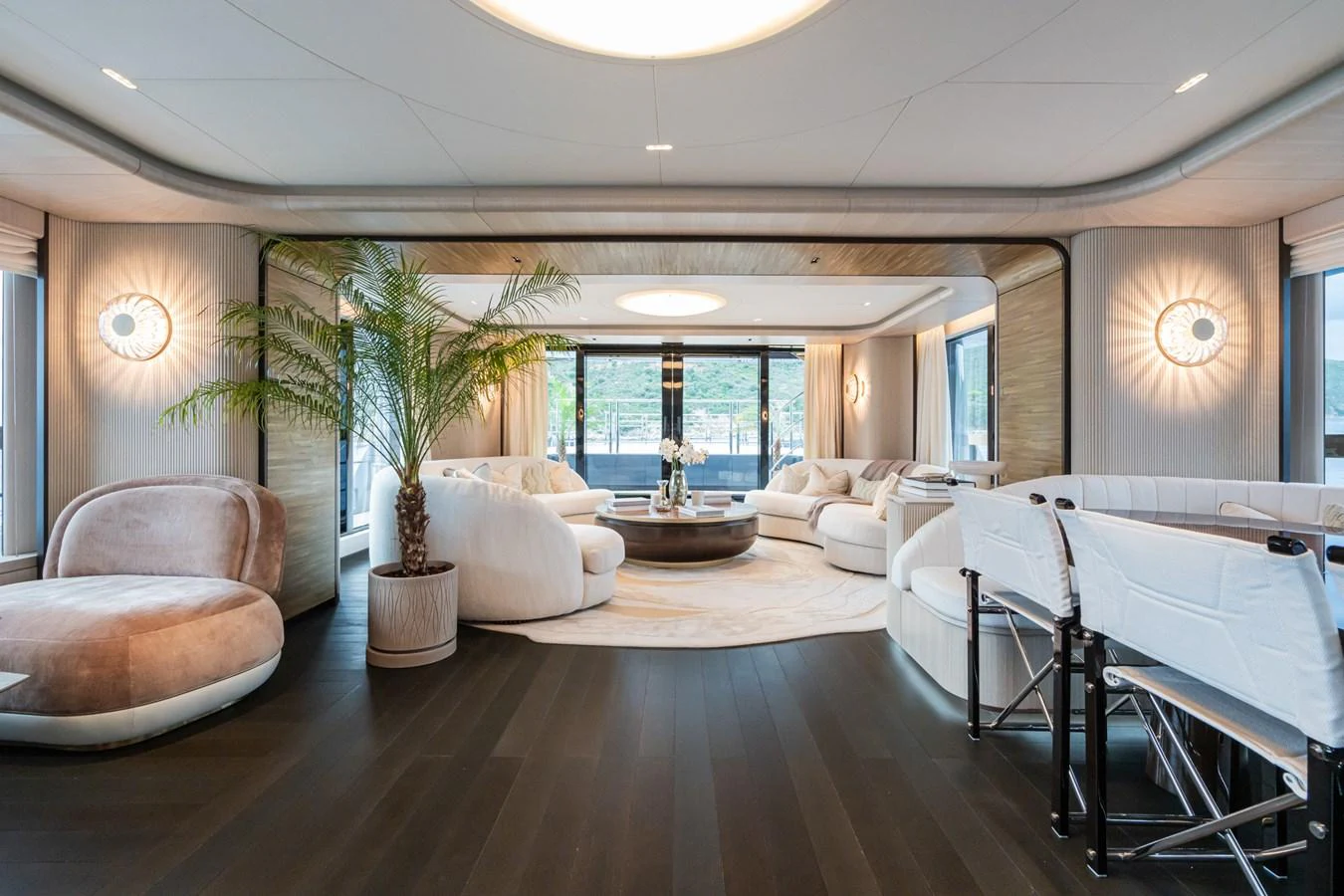 a large room with a table and chairs aboard M Yacht for Sale