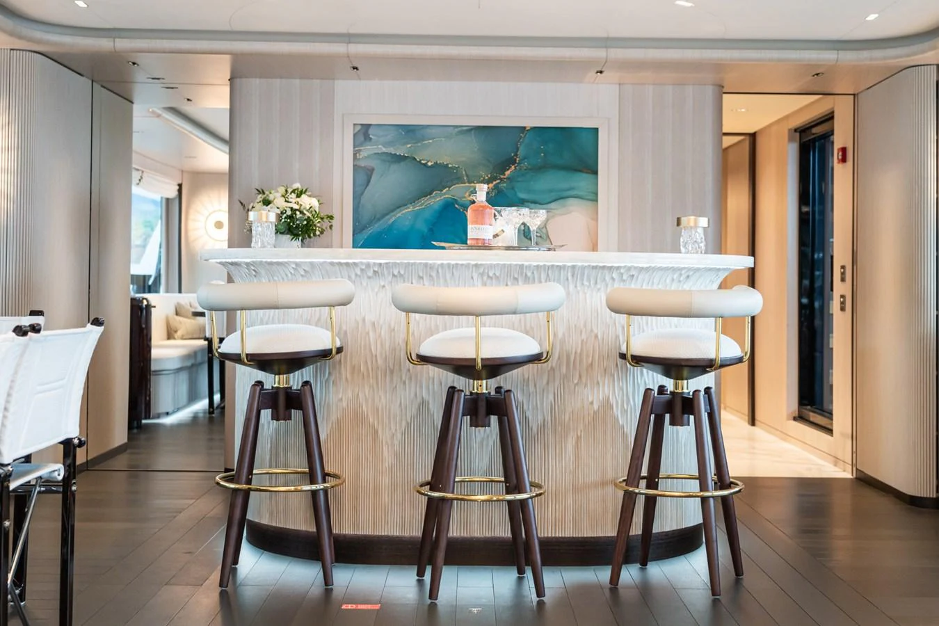 a room with stools and stools aboard M Yacht for Sale