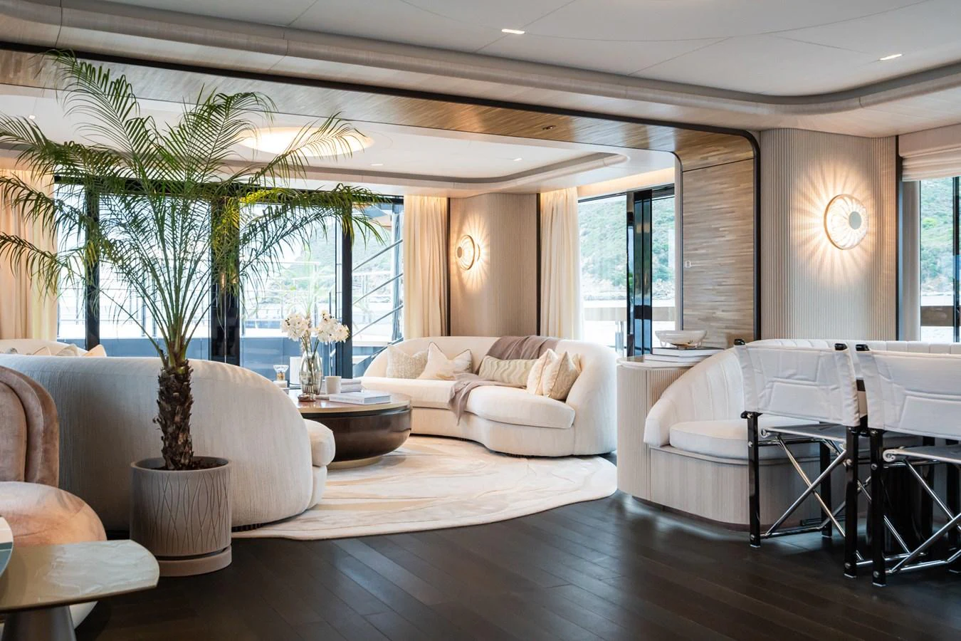 a living room with a large window aboard M Yacht for Sale