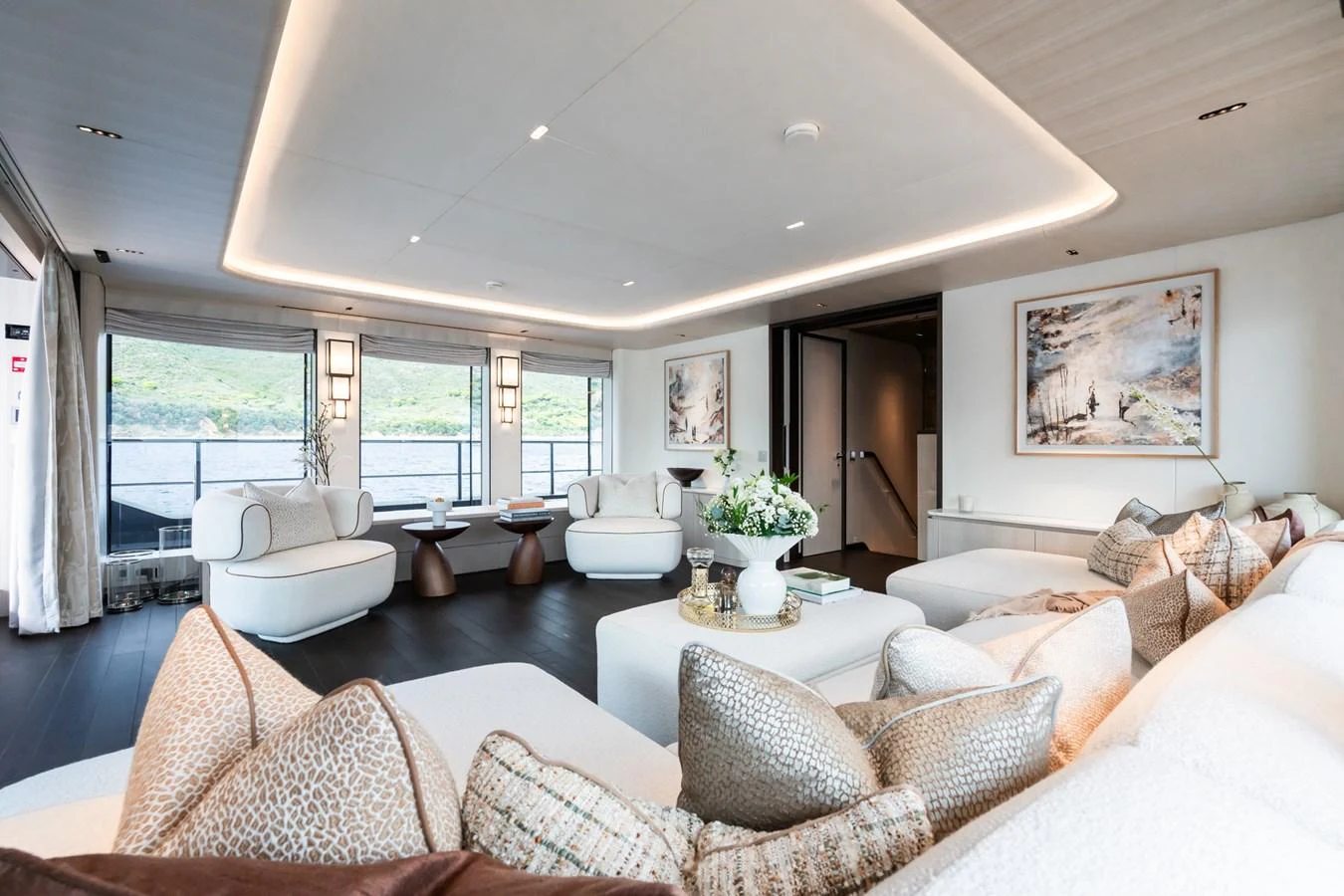 a living room with a large window aboard M Yacht for Sale