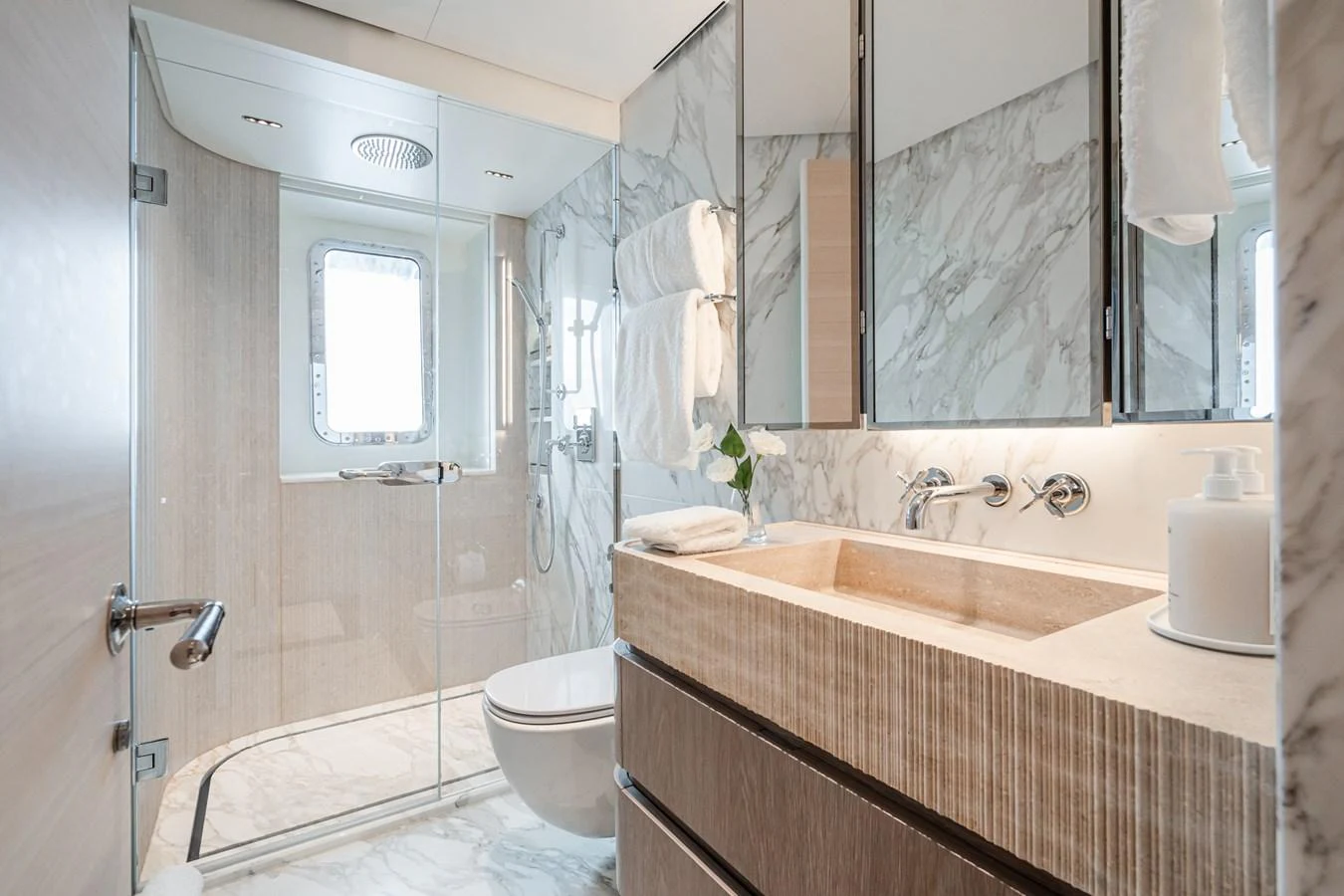 a bathroom with a sink toilet and a bathtub aboard M Yacht for Sale