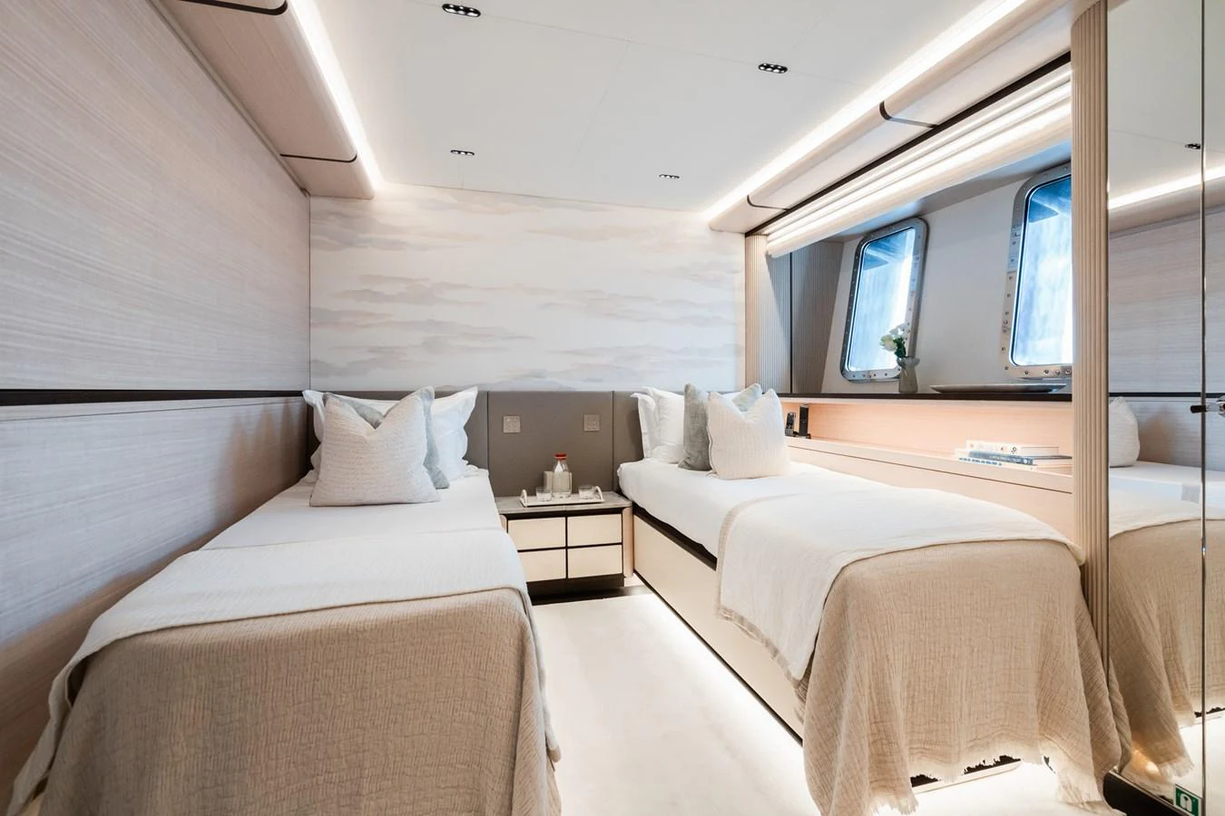 a room with beds and a window aboard M Yacht for Sale