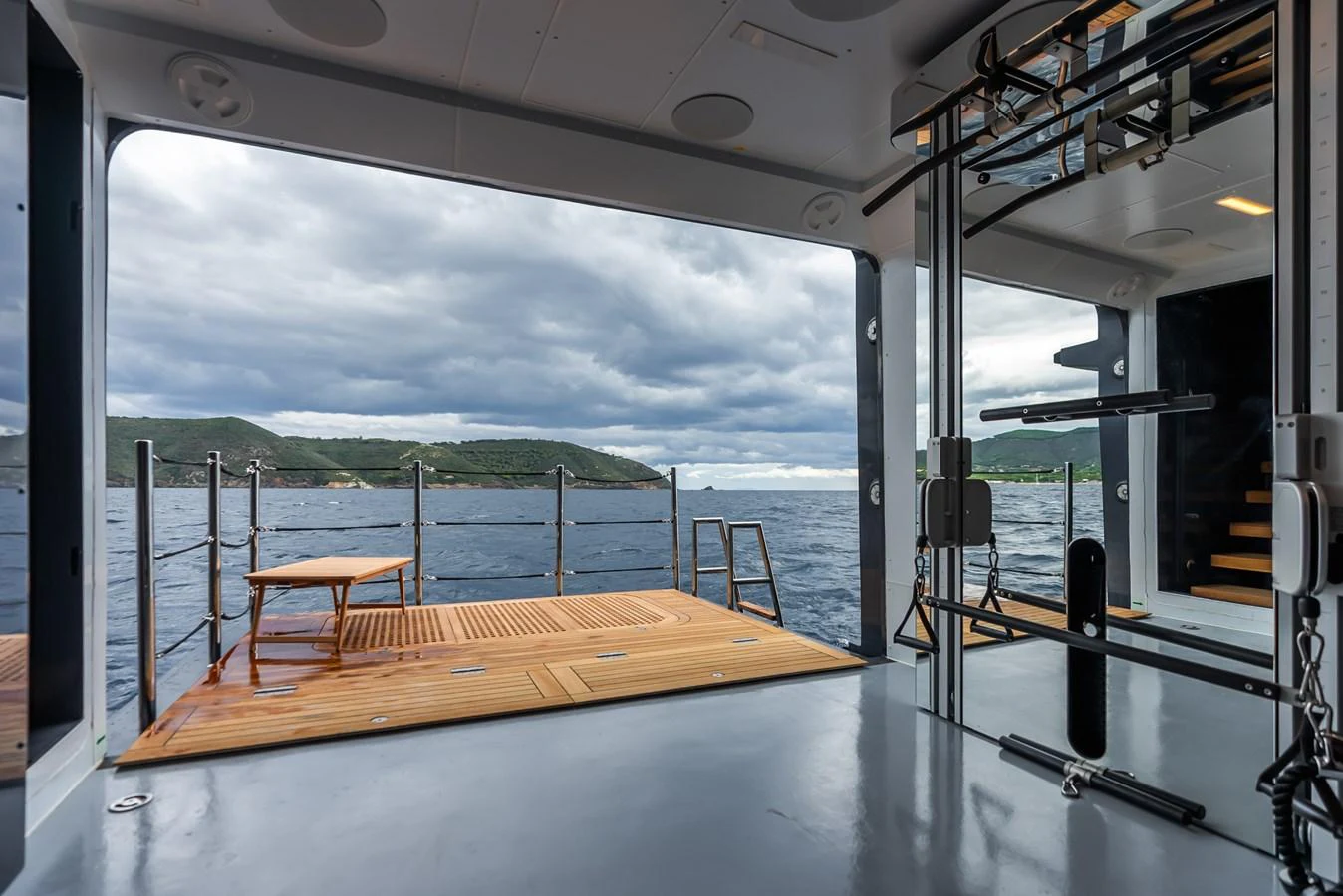a boat on a deck aboard M Yacht for Sale