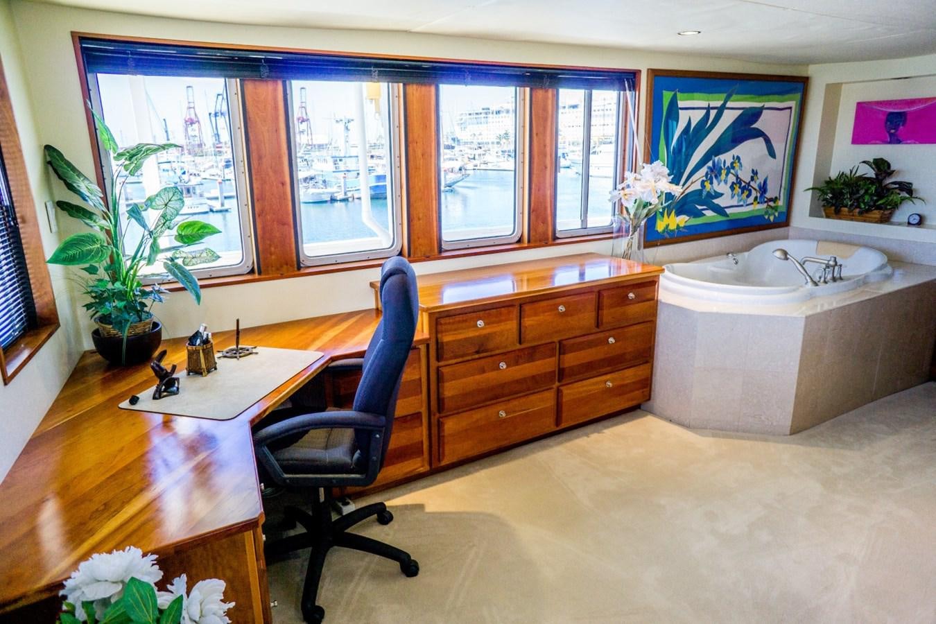 a room with a sink and a bathtub aboard BEAUPORT Yacht for Sale