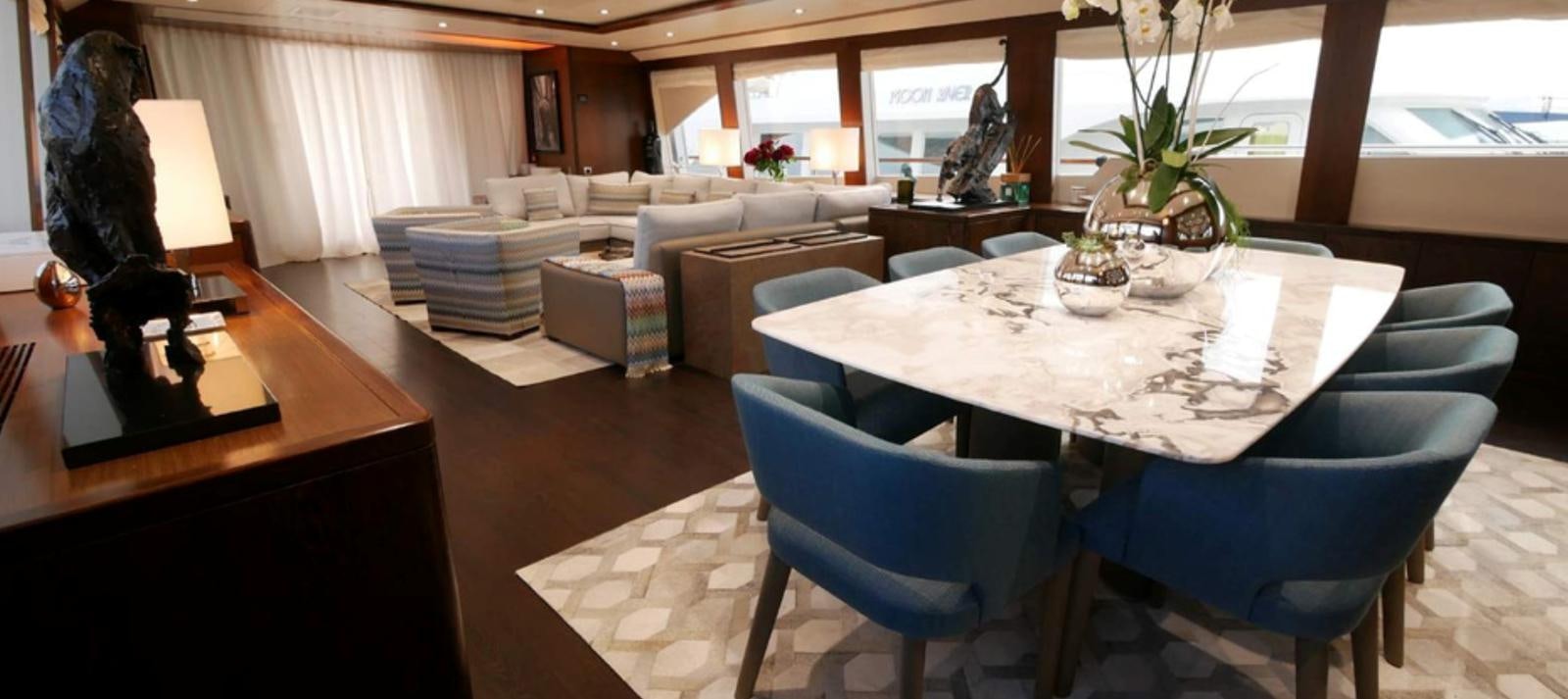 a room with a table and chairs aboard ASCENSION Yacht for Sale