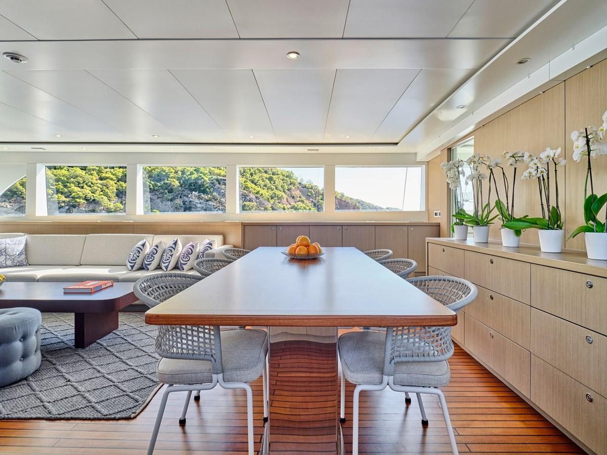 a kitchen and dining area aboard BOOBALE Yacht for Sale