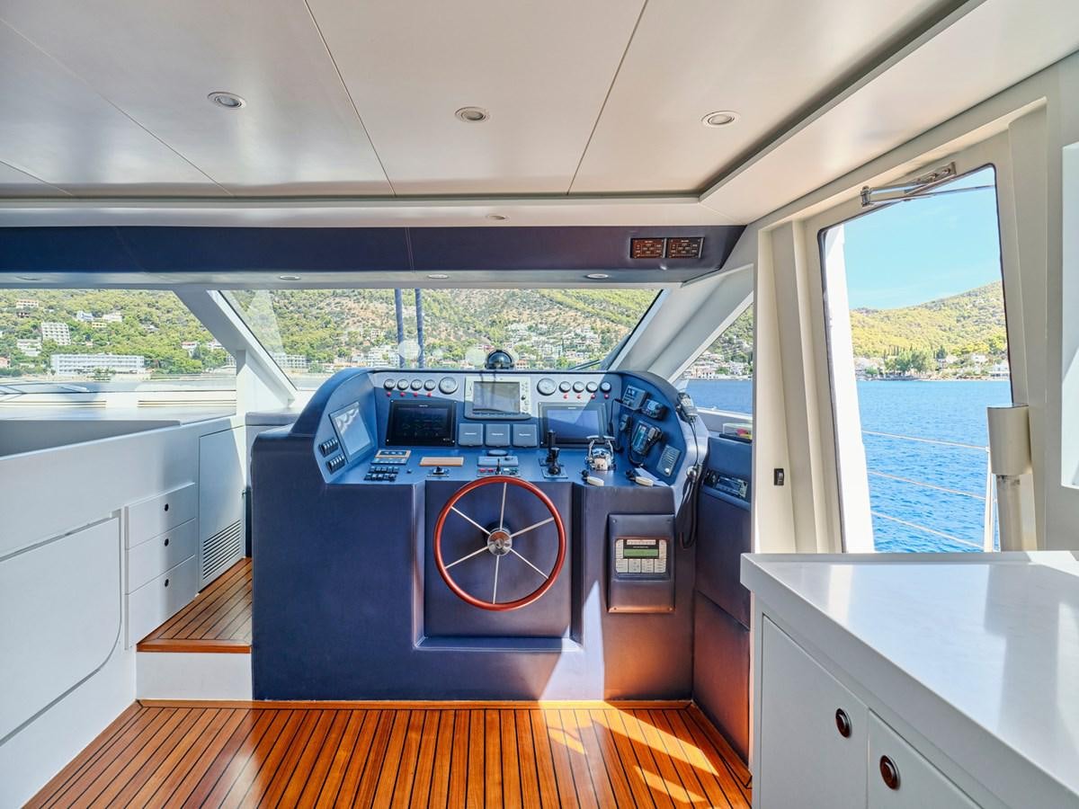 a large room with a large window aboard BOOBALE Yacht for Sale