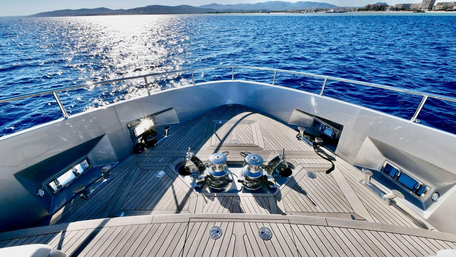 a large ship in the water aboard BASILIC Yacht for Sale