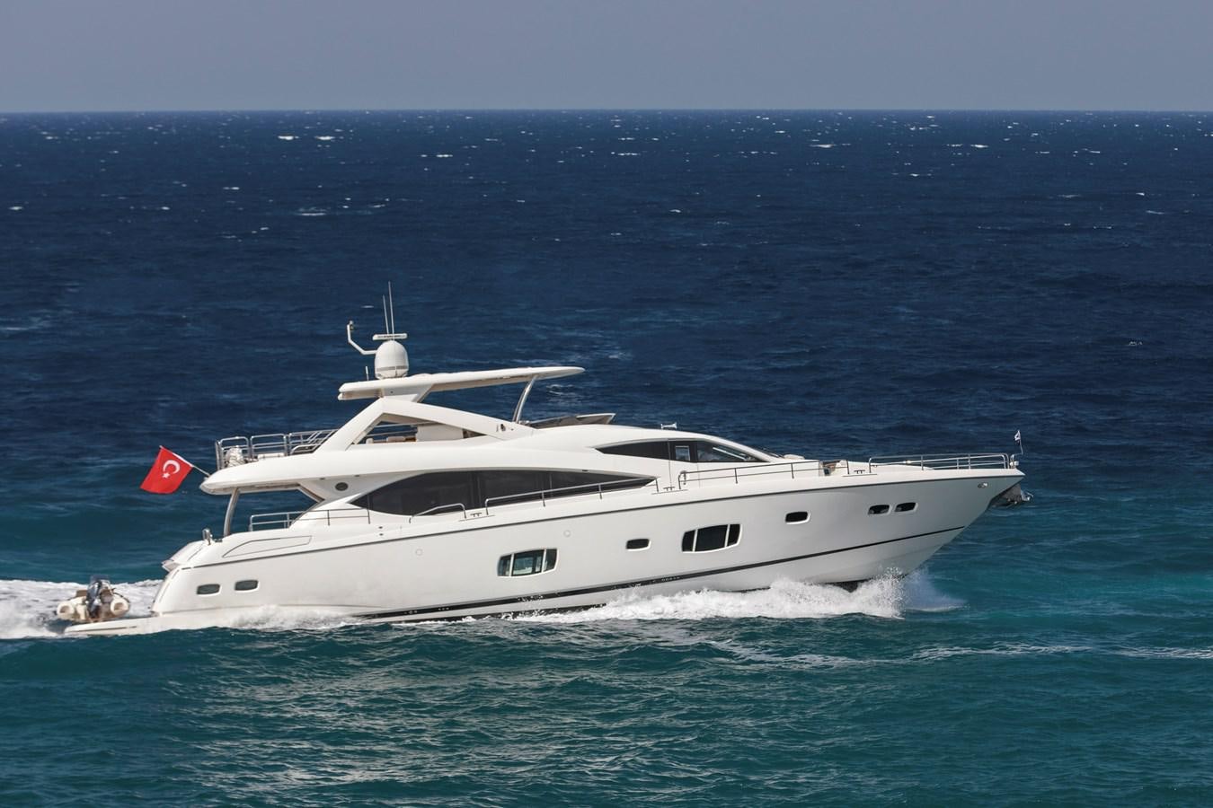 a white yacht in the ocean aboard SSM Yacht for Sale
