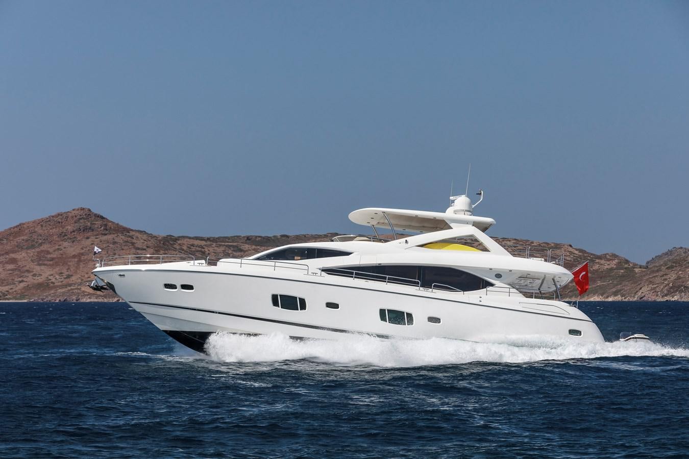 a white yacht in the water aboard SSM Yacht for Sale