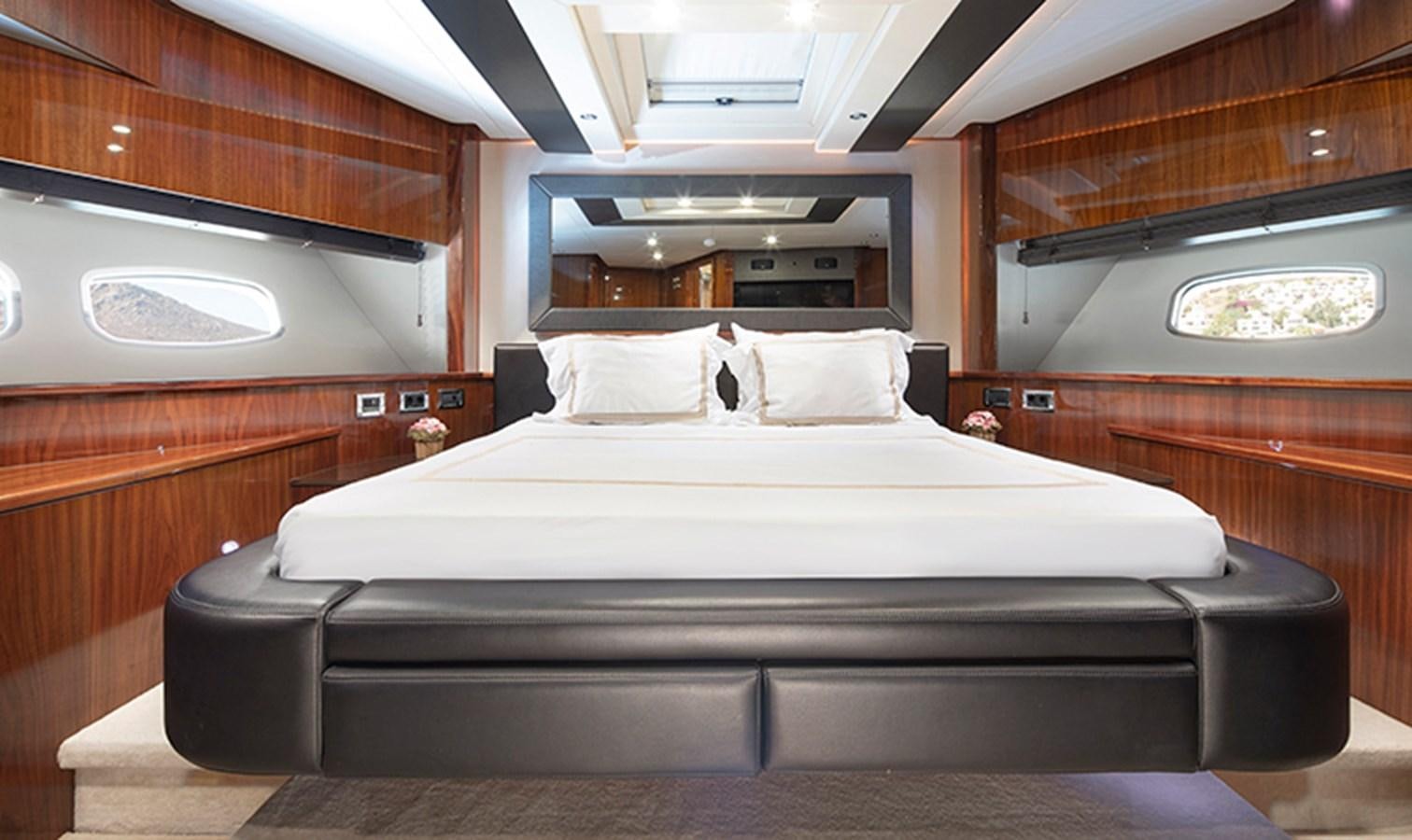 a bed in a room aboard SSM Yacht for Sale