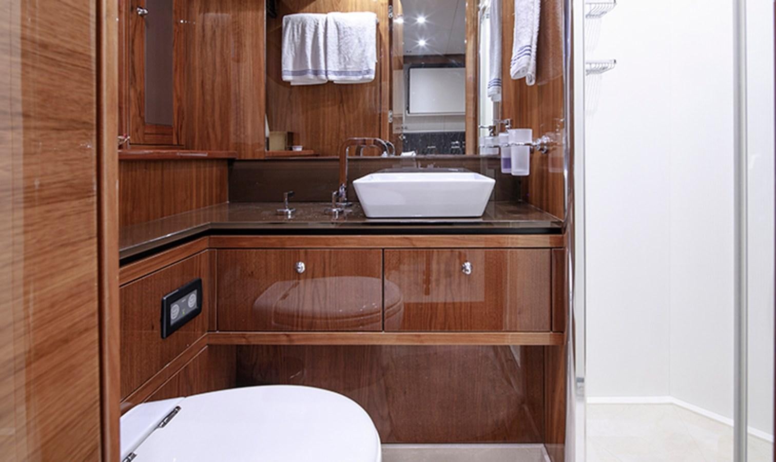 a bathroom with a sink and a toilet aboard SSM Yacht for Sale