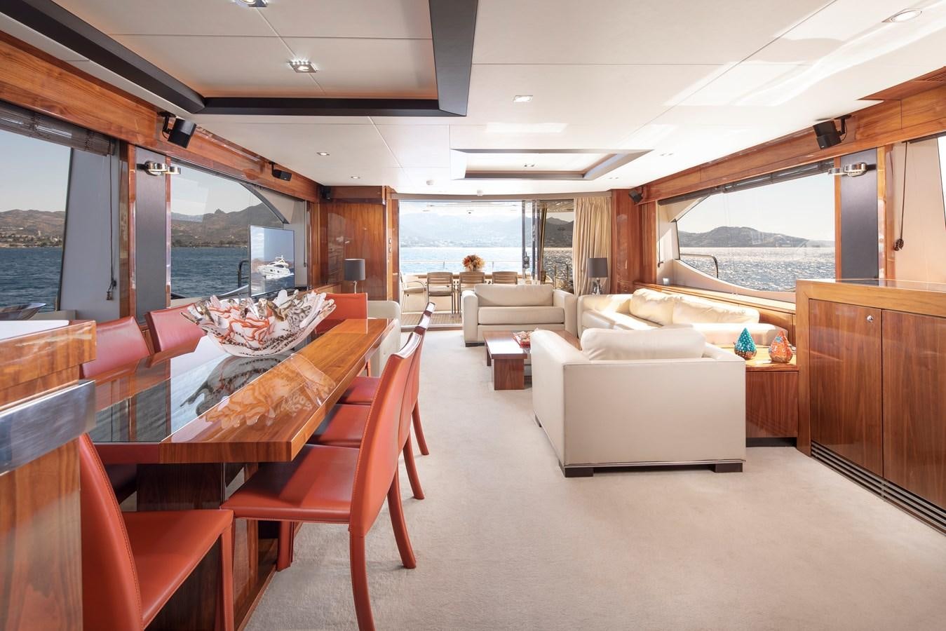 a room with a bed and a couch aboard SSM Yacht for Sale