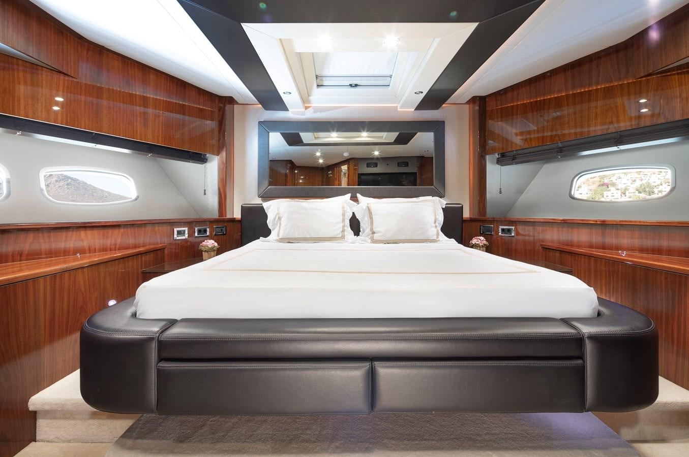 a bed in a room aboard SSM Yacht for Sale