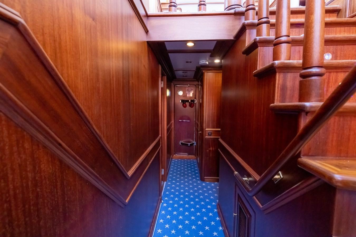 a room with wood walls and wood floors aboard 85 CLASSIC Yacht for Sale