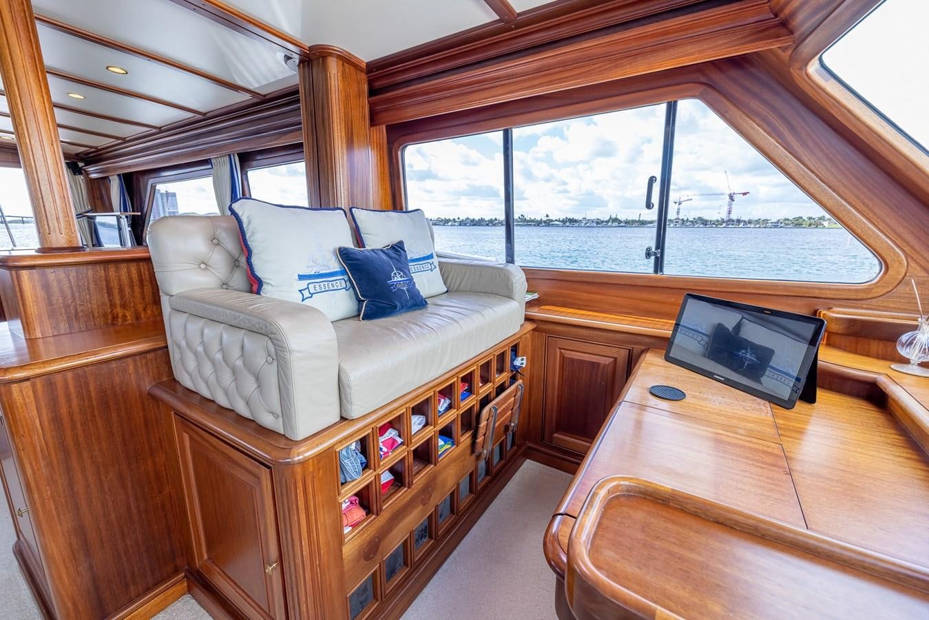 a living room with a large window aboard 85 CLASSIC Yacht for Sale