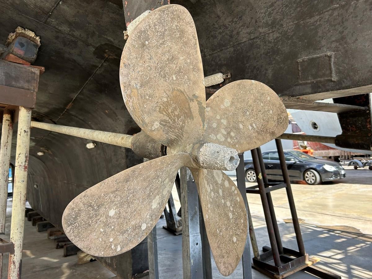 a wooden structure with a large piece of wood in the middle aboard MOTORSAILLOR Yacht for Sale