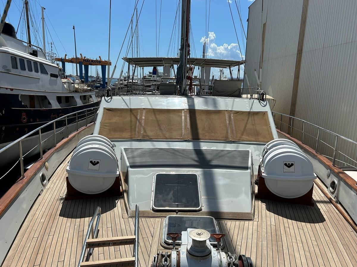 a boat on the water aboard MOTORSAILLOR Yacht for Sale