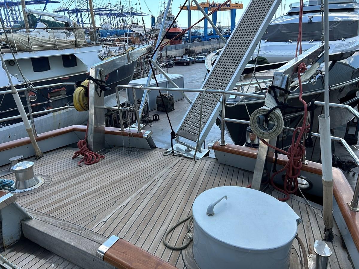 a boat dock with many boats aboard MOTORSAILLOR Yacht for Sale
