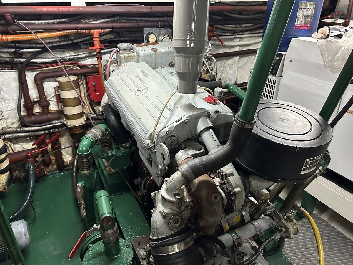 a machine with a large piece of metal aboard MOTORSAILLOR Yacht for Sale