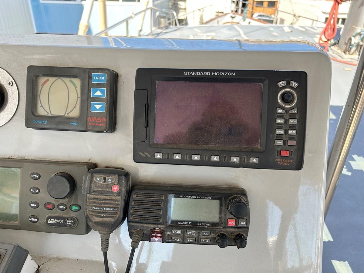 a radio inside a car aboard MOTORSAILLOR Yacht for Sale